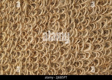 Jute washcloth extreme close up for texture and background. Textured surface made of rough rope loops Stock Photo
