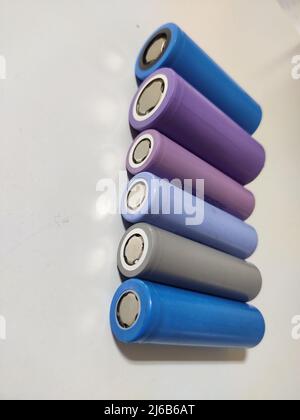 Rechargeable Lithium iron phosphate (LiFePO4 ) or LFP (lithium ferrophosphate) Cells on white background. LiFePO 4 batteries, green power energy. Stock Photo