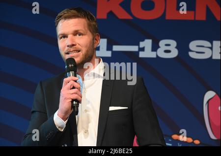 29 April 2022, North Rhine-Westphalia, Cologne: Moderator Konstantin Klostermann at the press conference for the European Men's Basketball Championship FIBA EuroBasket 2022 which will take place from 01-18.09.2022 in the LanxessArena in Cologne. Photo: Horst Galuschka/dpa Stock Photo