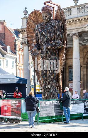 Northampton UK. The 27ft Knife Angel outside All Saints Church in the centre of town for a fortnight, The artwork, created by Alfie Bradley at the British Ironworks Centre at Oswestry in Shropshire, the sculpture is made from 100,000 knifes with blunted blades. Credit: Keith J Smith./Alamy Live News. Stock Photo