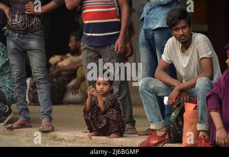 (220430) -- DHAKA, April 30, 2022 (Xinhua) -- Travelers wait for trains at a station in Dhaka, Bangladesh, April 29, 2022. As Eid al-Fitr approaches, hundreds of thousands of Dhaka dwellers have streamed out of the city to join the festival with their kith and kin in village homes. (Xinhua) Stock Photo