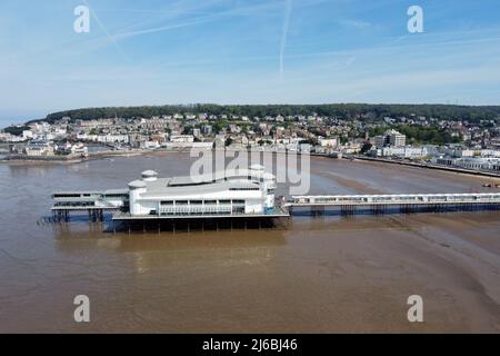 Weston-super-Mare, Somerset, UK.  30th April 2022.  UK Weather.  View from the air of the beach and Grand Pier at Weston-super-Mare in Somerset on a hot sunny morning at the start of the bank holiday weekend.  Picture Credit: Graham Hunt/Alamy Live News Stock Photo