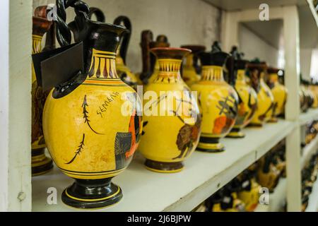 Kalambaka, Greece - June 10, 2018: A look at the exhibited items of a local shop in the city of Kalambaka in Greece. Stock Photo