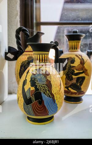 Kalambaka, Greece - June 10, 2018: A look at the exhibited items of a local shop in the city of Kalambaka in Greece. Stock Photo