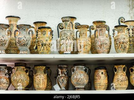 Kalambaka, Greece - June 10, 2018: A look at the exhibited items of a local shop in the city of Kalambaka in Greece. Stock Photo