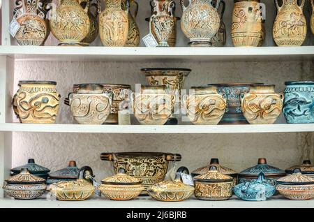 Kalambaka, Greece - June 10, 2018: A look at the exhibited items of a local shop in the city of Kalambaka in Greece. Stock Photo