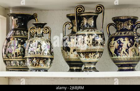 Kalambaka, Greece - June 10, 2018: A look at the exhibited items of a local shop in the city of Kalambaka in Greece. Stock Photo