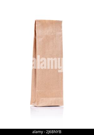 Recycled brown craft paper package for tea or coffee isolated on white background Stock Photo