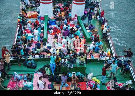 Eid-Ul-Fitr Journey by launch during the end time of the holy month of Ramadan after two years of Covid times. This image has been captured from Posto Stock Photo