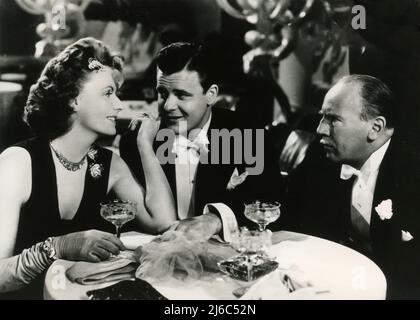 Swedish-American actress Greta Garbo, actors Melvyn Douglas and Roland Young in the movie Two-Faced Woman, USA 1941 Stock Photo