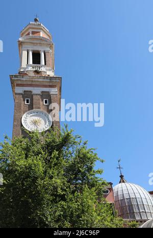 Bell tower of Church Saints apostles called Santi Apostoli in Venice in Italy in Europe Stock Photo