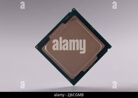 Computer Processor Grey Tiny central processing unit, processor chip on grey background Stock ...