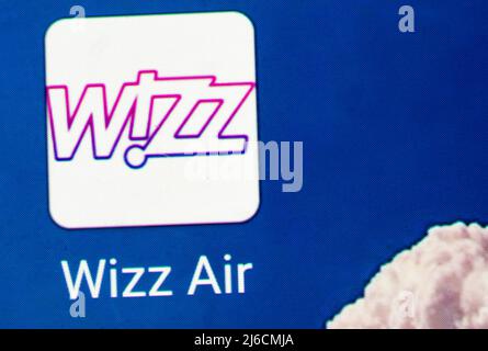 In this photo illustration, the Wizz Air application logo is displayed on a smartphone screen Stock Photo