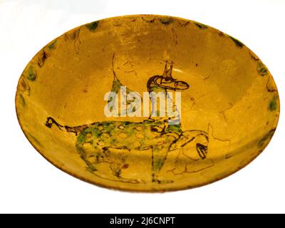 Deep dish Glazed ceramic with green and manganese decoration Second half of the 10th century Museum of Madinat al-Zahra (the shining city) - Cordoba, Spain Stock Photo