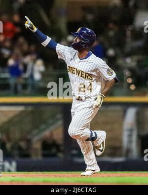 Milwaukee Brewers' Andrew McCutchen in action during a baseball game  against the Washington Nationals, Sunday, June 12, 2022, in Washington. (AP  Photo/Nick Wass Stock Photo - Alamy