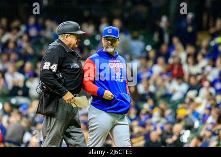 April 29, 2022 - Chicago Cubs manager David Ross talkes with the umpire after changing pitchers during MLB Baseball action between Chicago and Milwaukee at Miller Park in Milwaukee, WI. Stock Photo