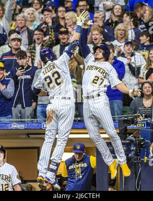 April 29, 2022 - Milwaukee Brewers left fielder Christian Yelich (22) celebrates his homerun with Milwaukee Brewers shortstop Willy Adames (27) during MLB Baseball action between Chicago and Milwaukee at Miller Park in Milwaukee, WI. Stock Photo