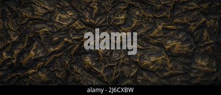 Black with gold paint crumpled paper texture background Stock Photo