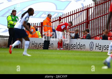 Oakwell, Barnsley, England - 30th April 2022 Aiden Marsh (37) of Barnsley signs a fans ball - during the game Barnsley v Preston N.E., Sky Bet EFL Championship 2021/22, at Oakwell, Barnsley, England - 30th April 2022  Credit: Arthur Haigh/WhiteRosePhotos/Alamy Live News Stock Photo