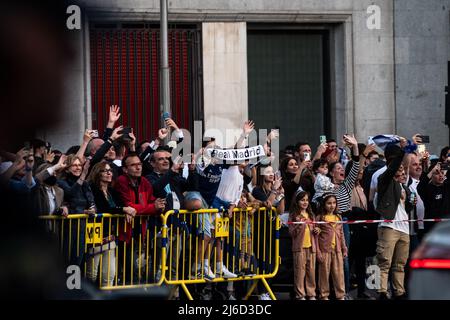 Real Madrid fans celebrating as a bus with the players arrive to Plaza de Cibeles. Real Madrid team won their 35th La Liga national title following the victory in a match against RCD Espanyol. Stock Photo