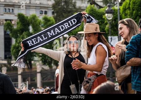 Real Madrid fans in Plaza de Cibeles celebrating the 35th La Liga national title that Real Madrid team won following their victory in a match against RCD Espanyol. Stock Photo