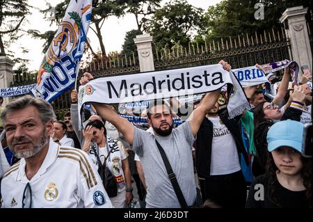 Real Madrid fans celebrating in Plaza de Cibeles the 35th La Liga national title that Real Madrid team won following their victory in a match against RCD Espanyol. Stock Photo