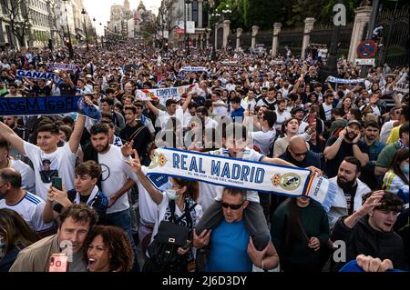 A large crowd of Real Madrid fans celebrating in Plaza de Cibeles the 35th La Liga national title that Real Madrid team won following their victory in a match against RCD Espanyol. Stock Photo