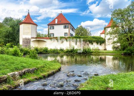 Landscape with Blutenburg Castle in summer, Munich, Germany, Europe. It is landmark of Munchen city. Scenery of old houses of Munich, Bavaria. Scenic Stock Photo