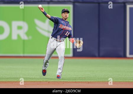 St. Petersburg, FL. USA; Minnesota Twins shortstop Jorge Polanco (11) fields a ground ball hit by Tampa Bay Rays second baseman Brandon Lowe (8) and t Stock Photo