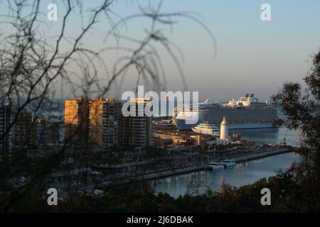 April 30, 2022, Malaga, Spain: A general view shows the cruise ship 'Wonder of the Seas' moored after arriving at Malaga Port. The new cruise ship of 'Royal Caribbeanâ€™s' is the world's largest cruise ship which can carry up to 6,988 passengers and 2,300 crew. The 'Wonder of the Seas', is 362 metres in length and 64 metres wide and has restaurants, swimming pools, a waterslide and a zipwire etc. Malaga port is the first European destination and berth of Royal Caribbeanâ€™s Wonder of the Seas. (Credit Image: © Jesus Merida/SOPA Images via ZUMA Press Wire) Stock Photo