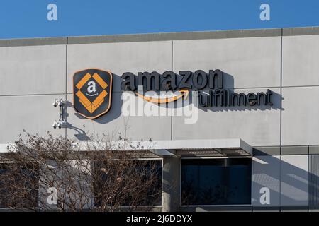 Amazon logo on the company warehouse building located in Lyon, France ...