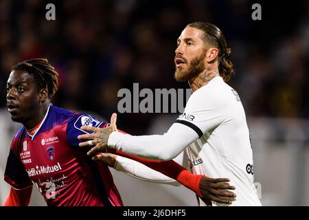 Clermont-Ferrand, France - April 09: Sergio Ramos of Paris Saint Germain (R) fights for position with Mohamed Bayo of Clermont Foot (L) during the Lig Stock Photo