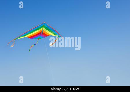 kite flying in the clear blue sky Stock Photo