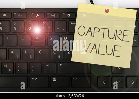 Text sign showing Capture Value. Business showcase Customer Relationship Satisfy Needs Brand Strength Retention Computer Keyboard And Symbol Stock Photo