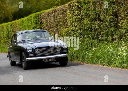 Various marques taking part in the classic cars springtime Rotary Club charity 'Wye Run' through Wales and the Wye Valley. Stock Photo