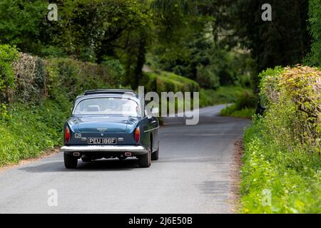 Various marques taking part in the classic cars springtime Rotary Club charity 'Wye Run' through Wales and the Wye Valley. Stock Photo