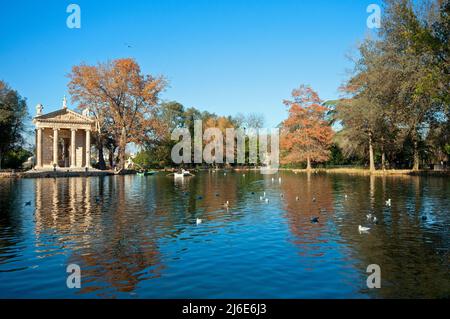 Small lake in Villa Borghese Park with the neoclassical Temple of Aesculapius (built by architect Antonio Asprucci in 1785-1787), Rome, Lazio, Italy Stock Photo