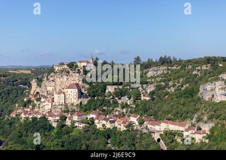 Super panoramic view of right steep rocky bank of river Alzou and ancient settlements of Rocamadour. Lot, Occitania, Southwestern France Stock Photo