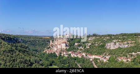 Geology and geography of surroundings of Rocamadour holy village, gorge of Alzou river on clear sunny morning. Lot, Occitania, Southwestern France Stock Photo