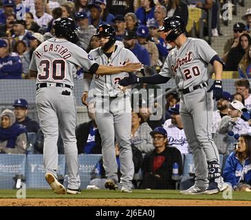 Los Angeles, California, USA. . 01st May, 2022. Detroit Tigers' Javier Baez (28), Harold Castro (30) and Spencer Torkelson (20) celebrate after scoring two runs on a broken-bat single from Austin Meadows during the seventh inning against the Los Angeles Dodgers at Dodger Stadium in Los Angeles on April 30, 2022.   Photo by Jim Ruymen/UPI Credit: UPI/Alamy Live News Stock Photo