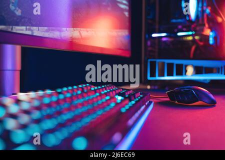 Pro Gaming desktop in neon colours closeup Stock Photo