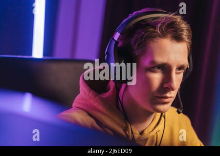 Young cyber sportsman streaming live video game Stock Photo