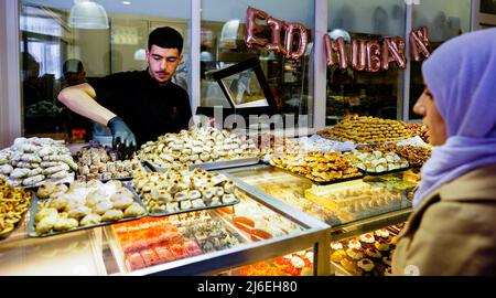The Hague, Netherlands. 1st May 2022. 2022-05-01 12:21:05 THE HAGUE - Crowded at the Moroccan bakery Marrakesh because of the Sugar Fest. The Islamic fasting month of Ramadan is over. Muslims around the world celebrate the end of the fast with Eid al-Fitr. ANP MARCO DE SWART netherlands out - belgium out Credit: ANP/Alamy Live News Stock Photo