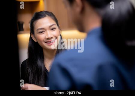 Young asian businesswoman and colleague brainstorm for planning and strategy of business and marketing at office, group of team meeting for creative w Stock Photo