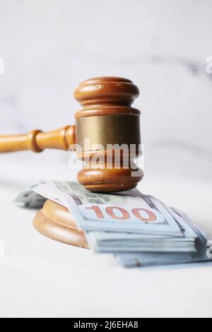 close up of gavel and cash on white background  Stock Photo