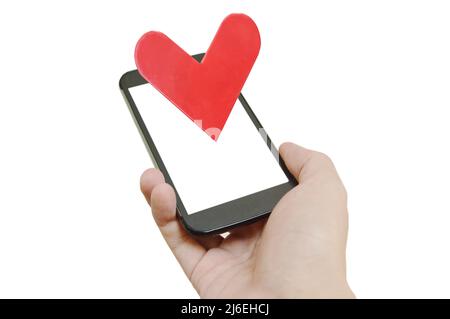 mobile phone holding on man hand sending red heart for lover in white background Stock Photo