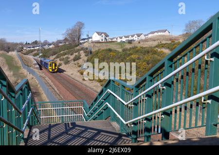 Scotrail class 158 train 158728 passing the footbridge at Gorebridge on the borders railway Stock Photo