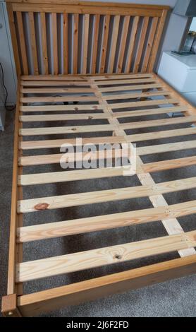 wooden slatted double bed frame Stock Photo