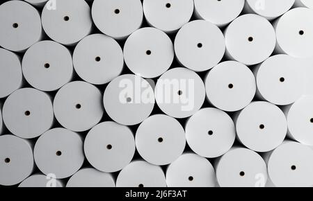 Group of white paper rolls in industrial factory for storage background. Production and manufacturing concept. 3D illustration rendering Stock Photo
