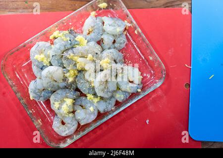 raw peel prawns in a white bowl without a marinate Stock Photo